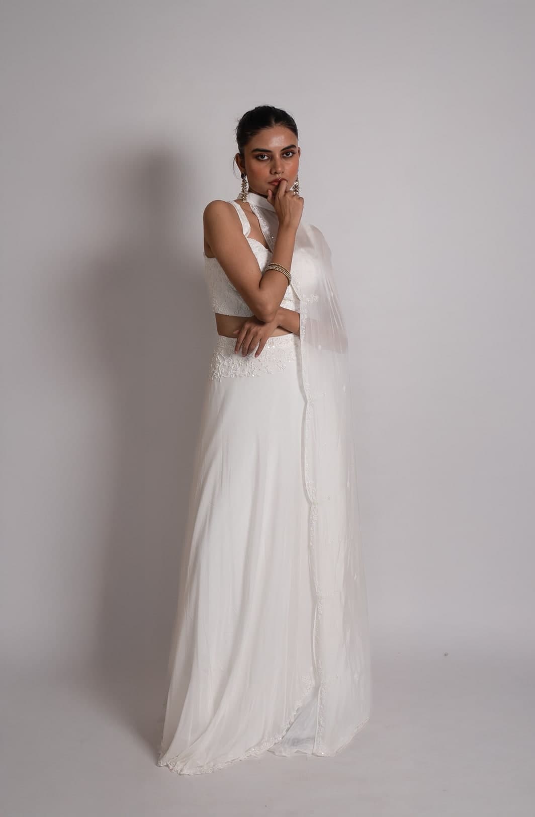 Noor lehenga set in ivory, full length, the one-sided dupatta falling straight